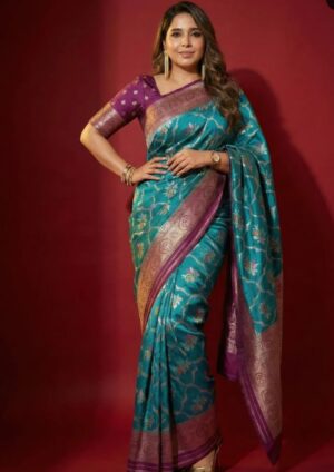 A royal blue and oliveBanarasi silk saree highlighted with antique gold zari weaving.